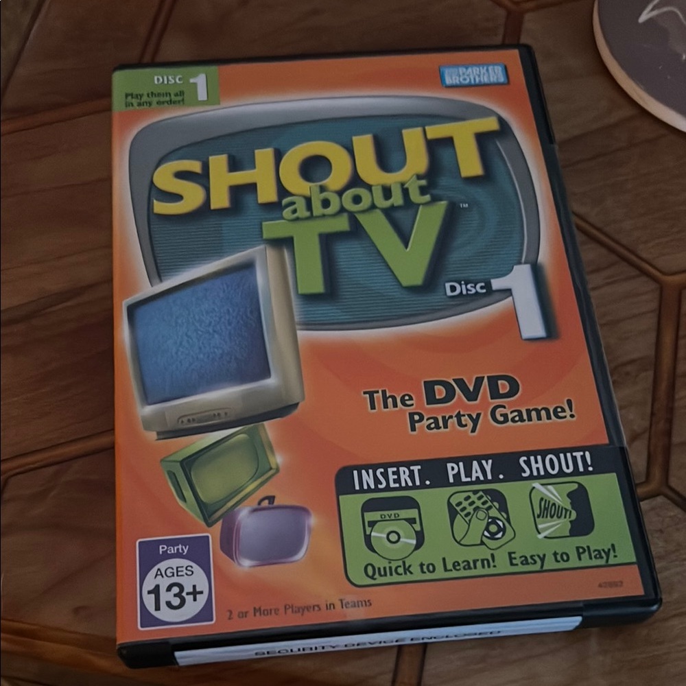 Hasbro Shout About TV DVD Party Game - Green and Orange
